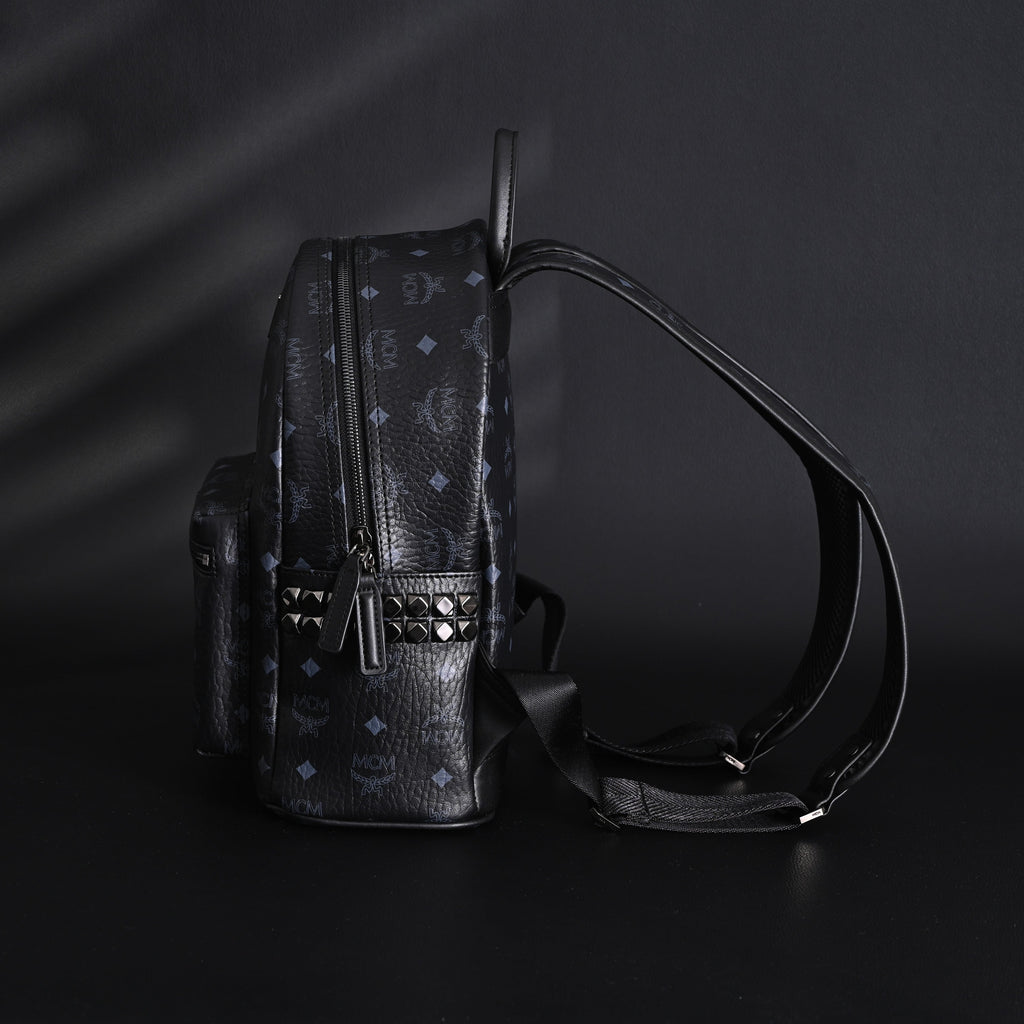 MCM Stark Visetos Medium Backpack – Black Monogram with Studded Detailing