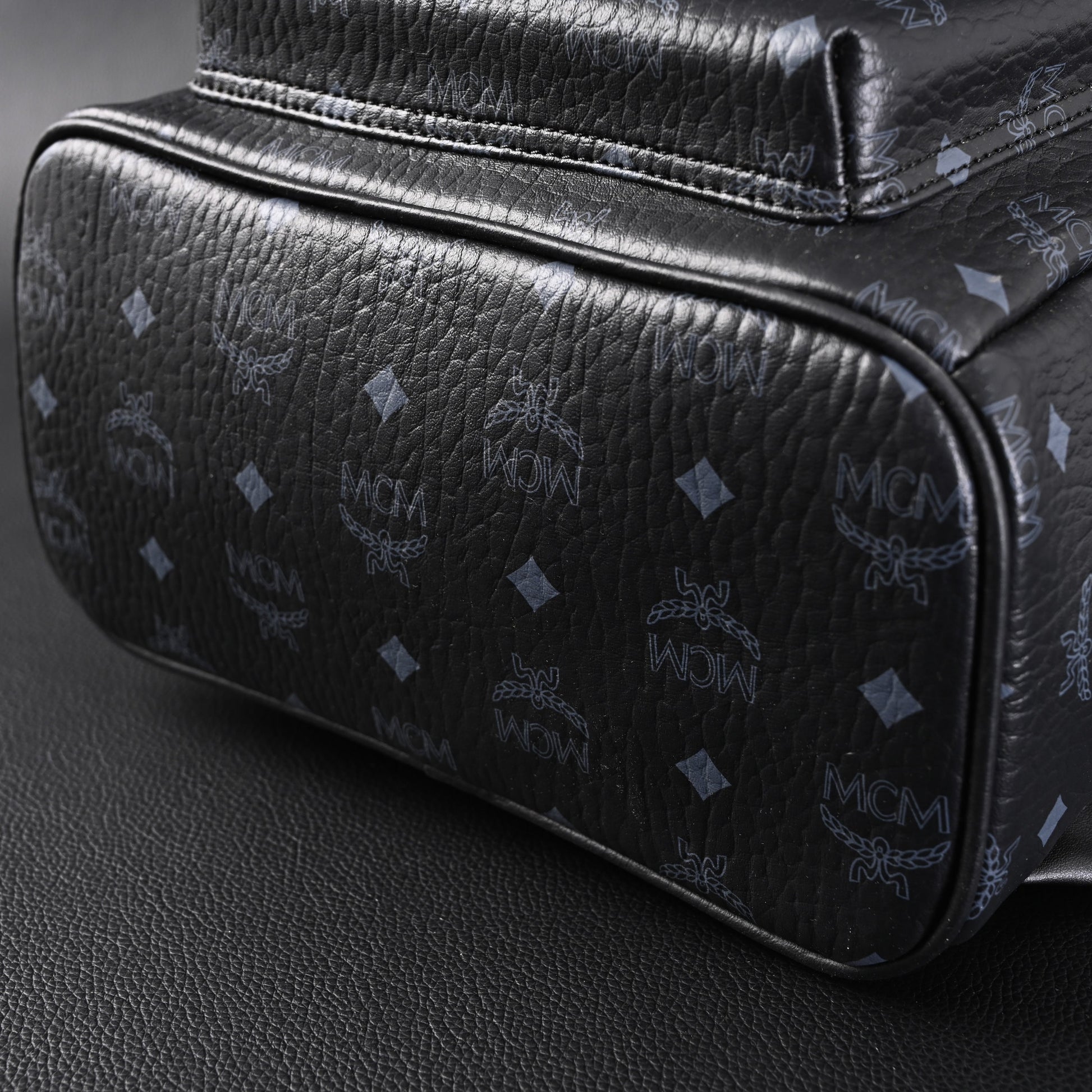 MCM Stark Visetos Medium Backpack – Black Monogram with Studded Detailing