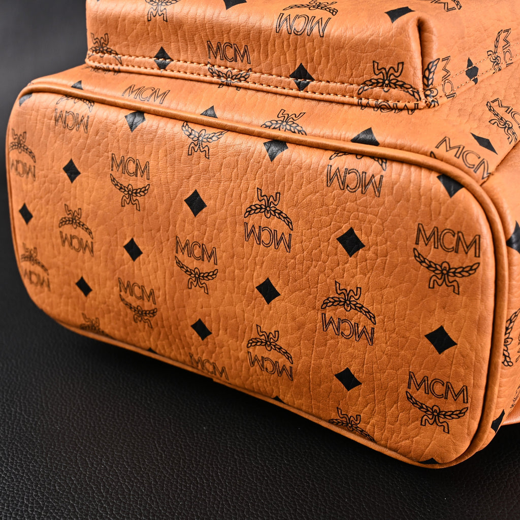 MCM Stark Visetos Medium Backpack – Cognac Monogram with Gold-Tone Studs