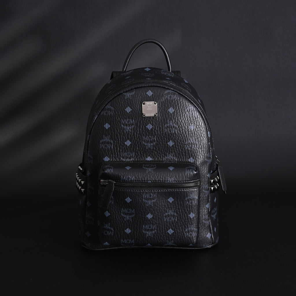 MCM Stark Visetos Medium Backpack – Black Monogram with Studded Detailing