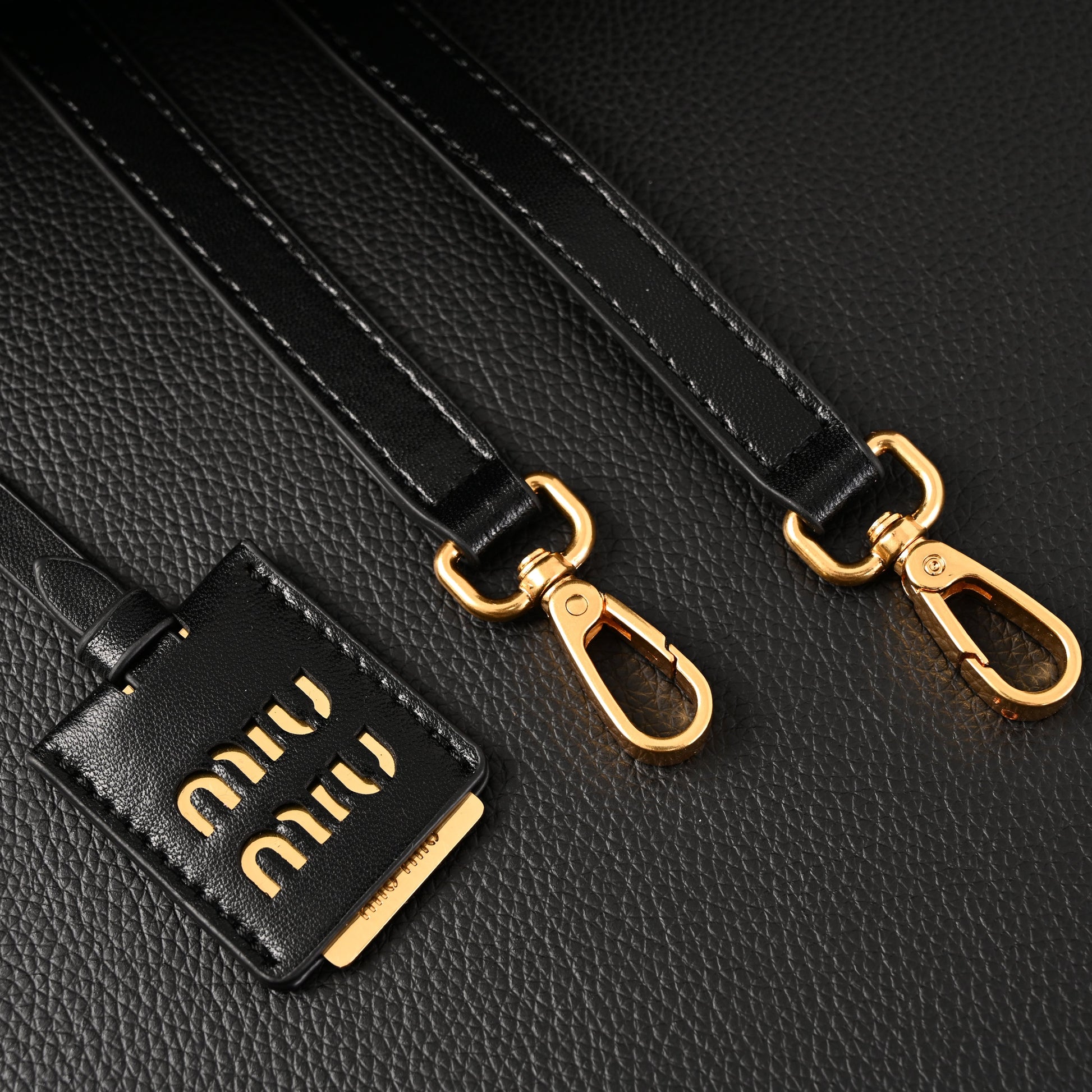 Miu Miu Black Matelassé Leather Top Handle Bag
