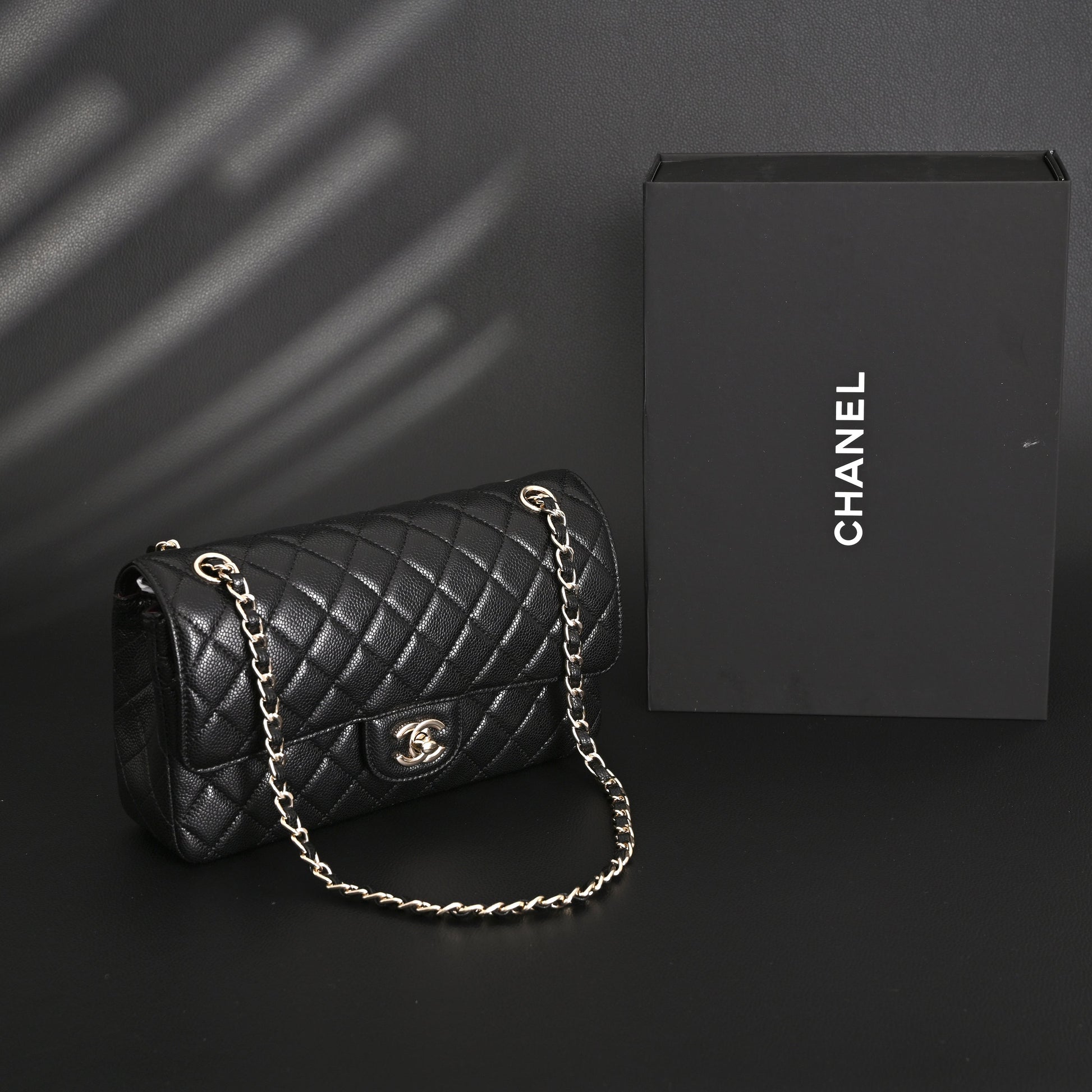 Chanel Classic Flap Bag – Black Quilted Caviar Leather with Gold-Tone Hardware
