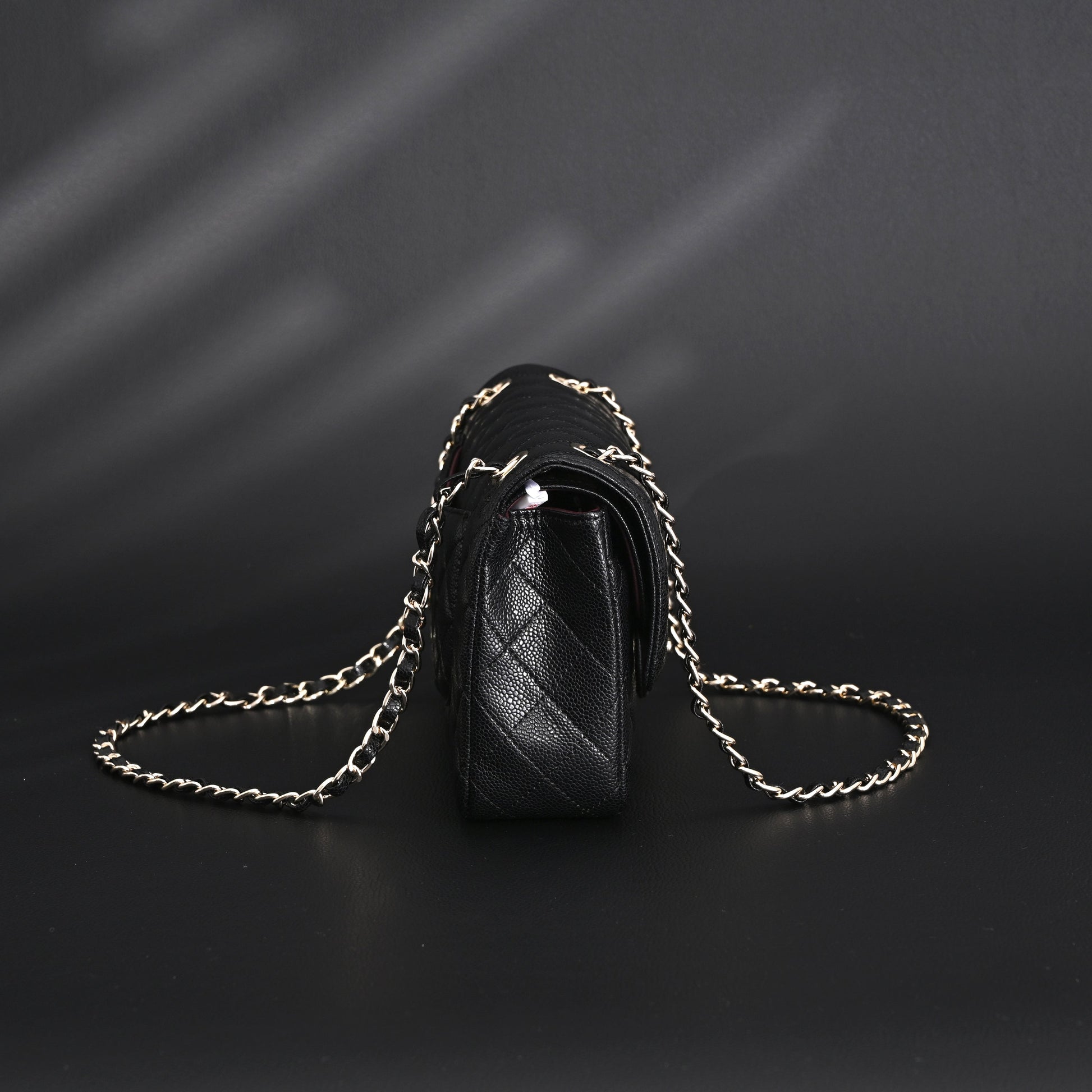 Chanel Classic Flap Bag – Black Quilted Caviar Leather with Gold-Tone Hardware