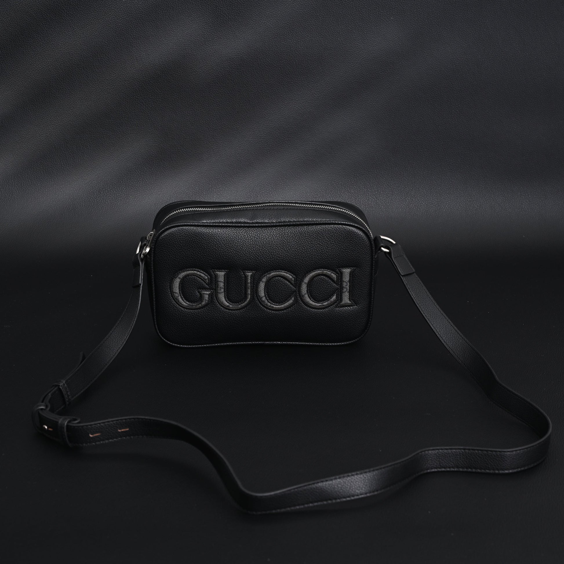 Gucci Black Leather Embossed Logo Belt Bag