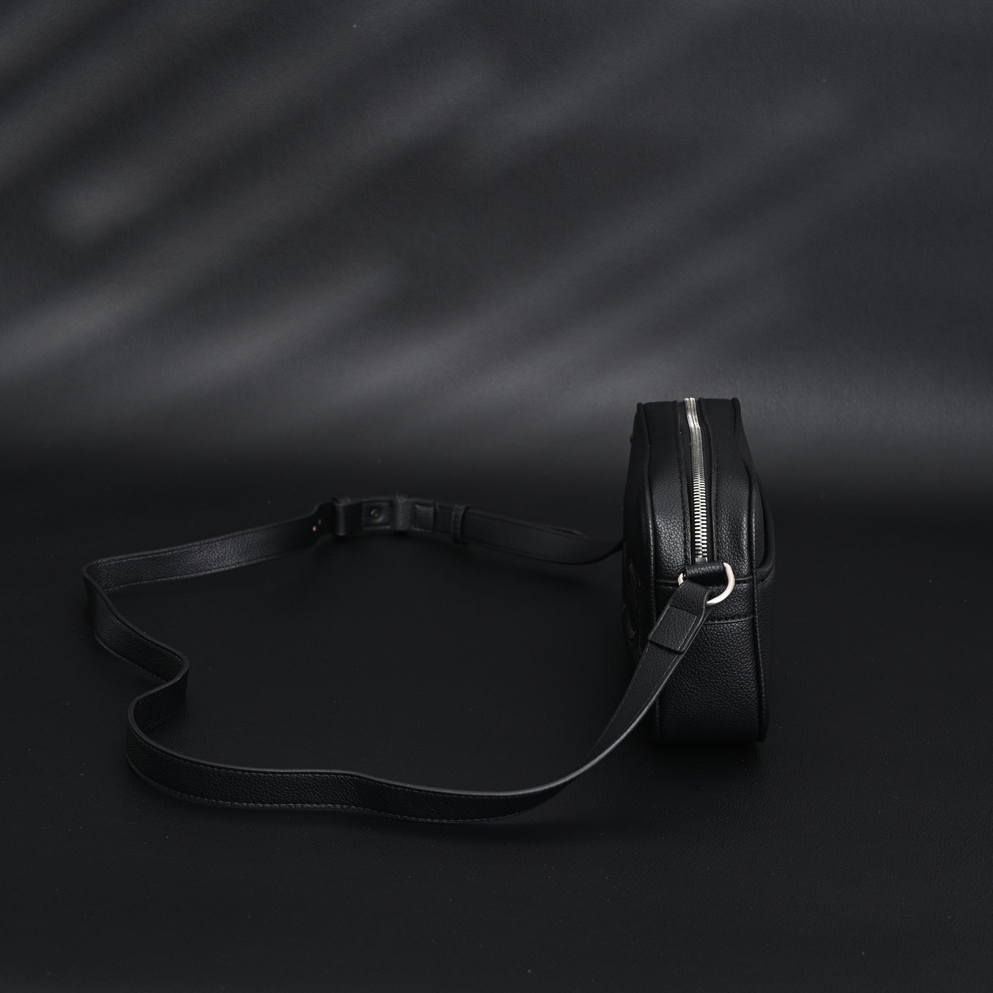 Gucci Black Leather Embossed Logo Belt Bag