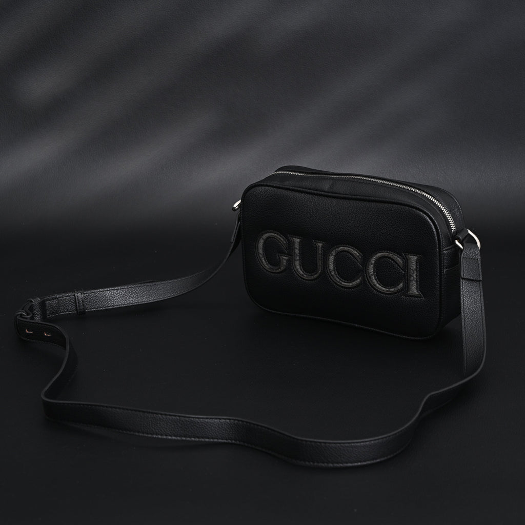 Gucci Black Leather Embossed Logo Belt Bag