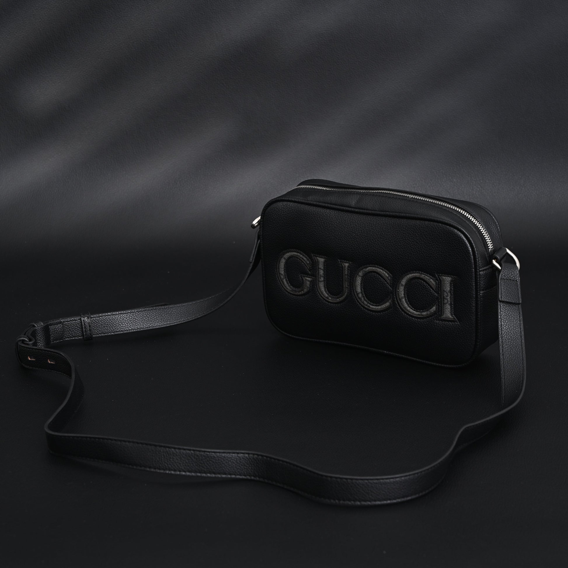 Gucci Black Leather Embossed Logo Belt Bag