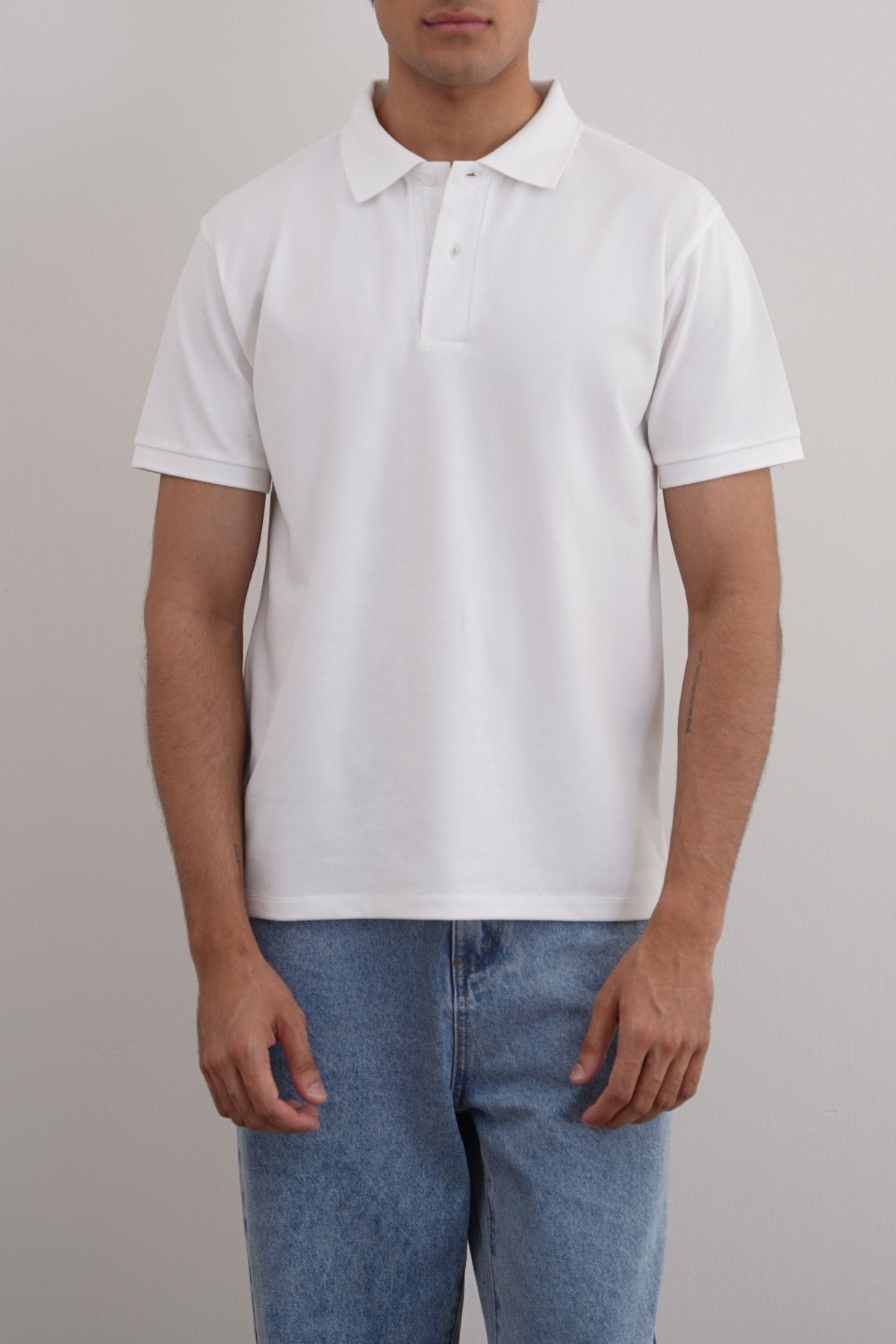 White Relaxed Fit Half Sleeve Cotton Polo Shirt