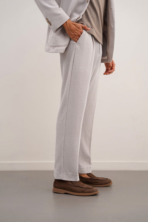Beige Pleated Regular Fit Textured Trousers