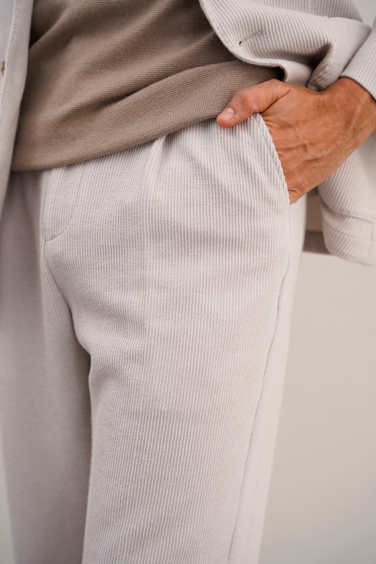 Beige Pleated Regular Fit Textured Trousers