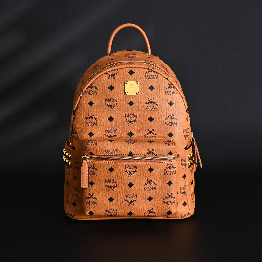 MCM Stark Visetos Medium Backpack – Cognac Monogram with Gold-Tone Studs